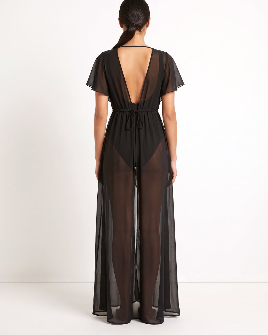 Black shoulder detailed coverup, back view on model