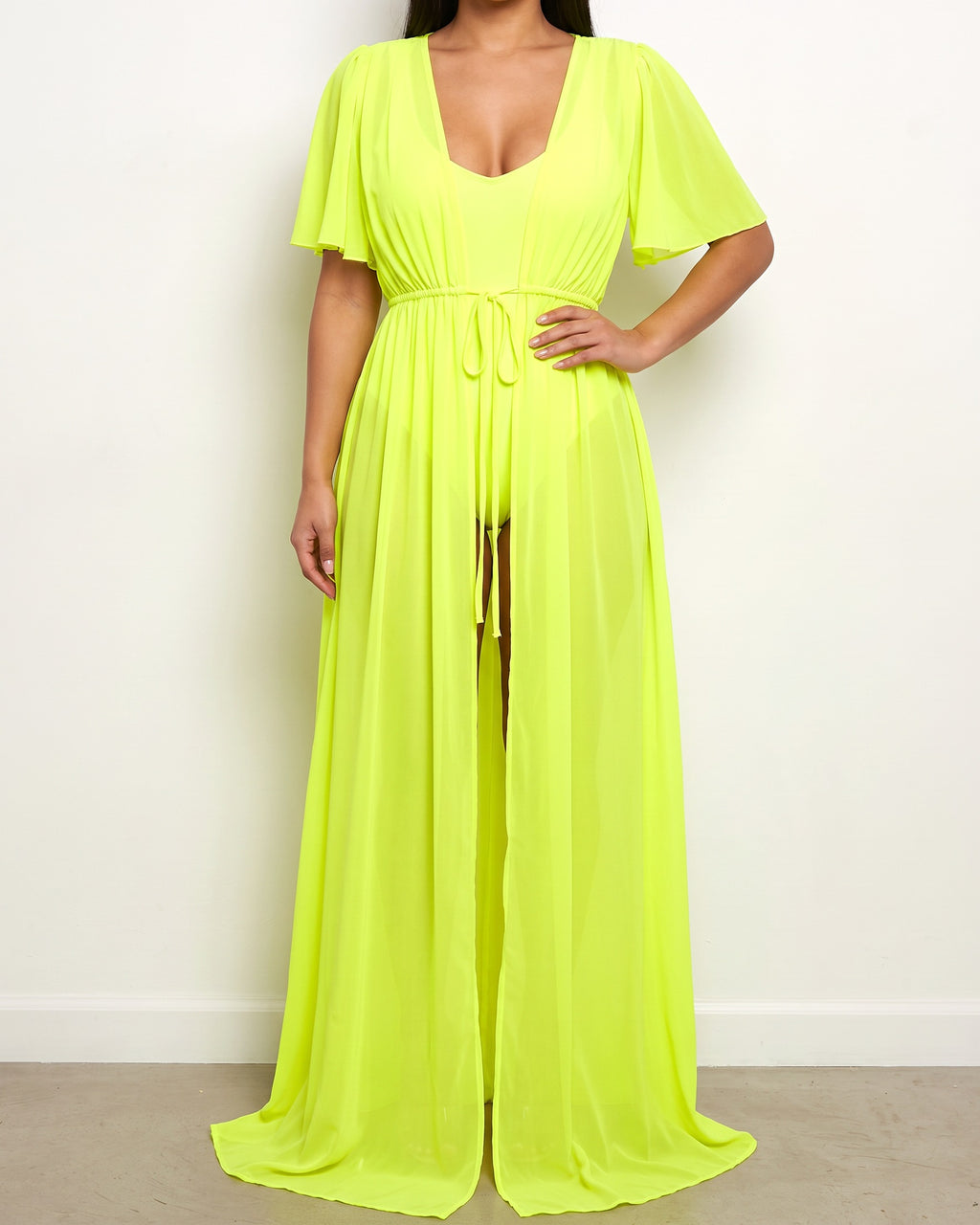 Neon yellow shoulder detailed coverup, alternate front view on model