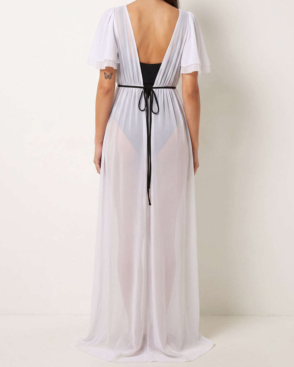 White shoulder detailed coverup, back view on model