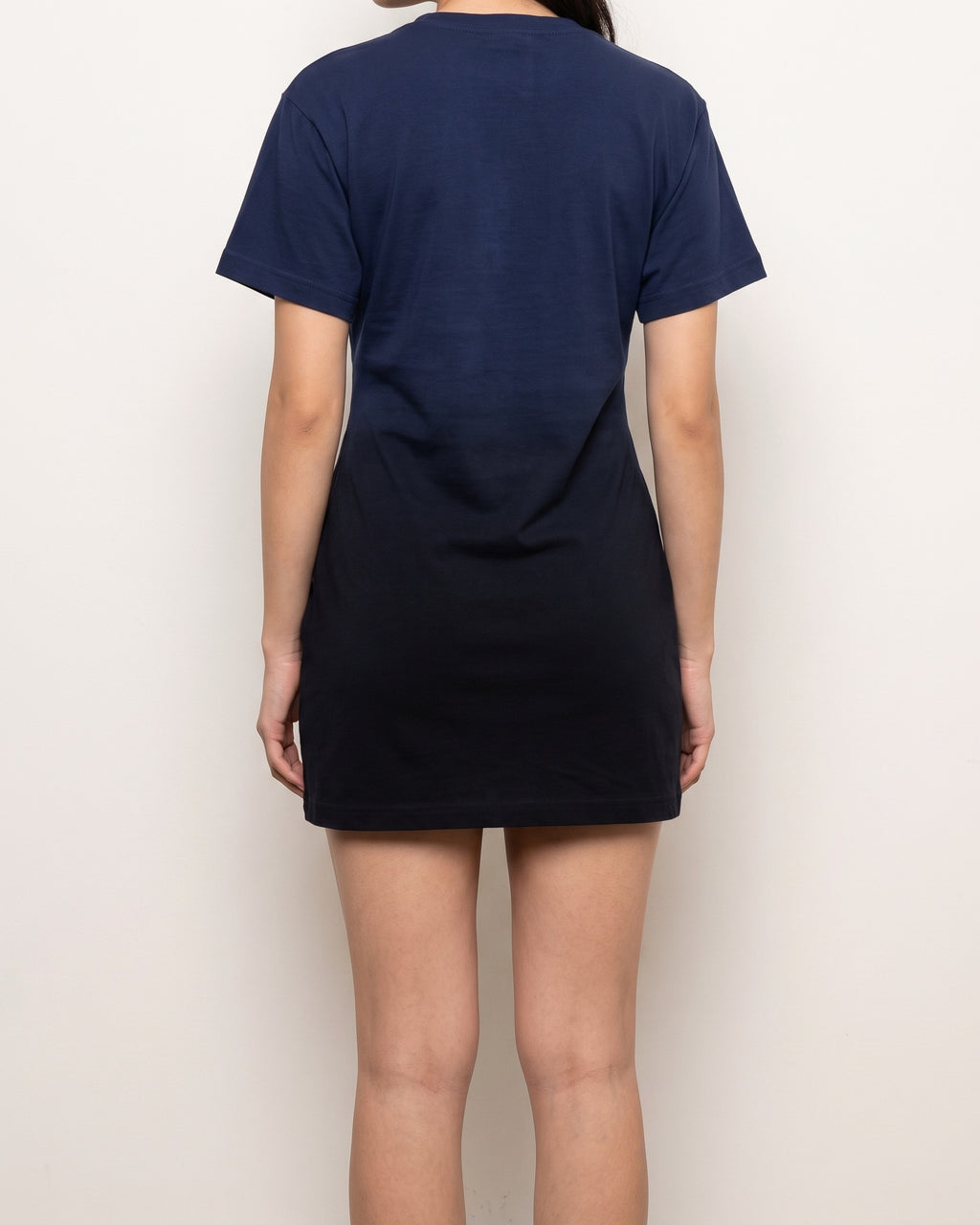 Navy lace up ombre mini dress, back view on model