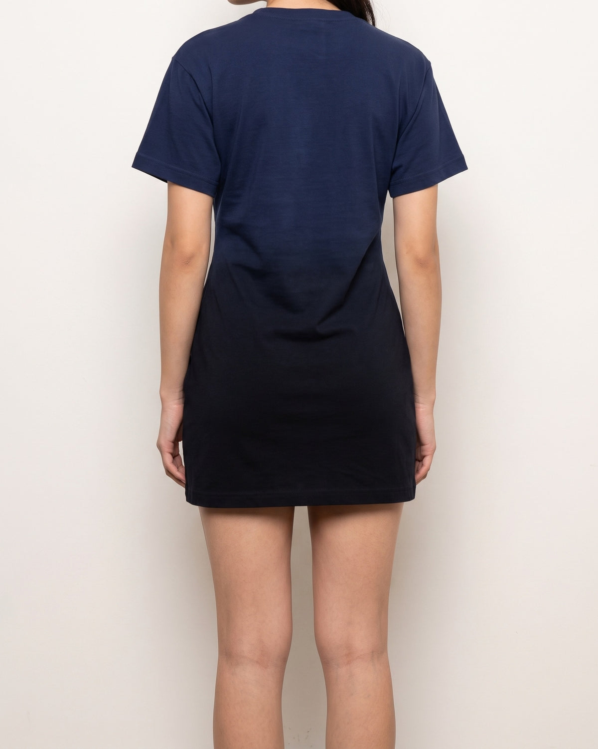 Navy lace up ombre mini dress, back view on model