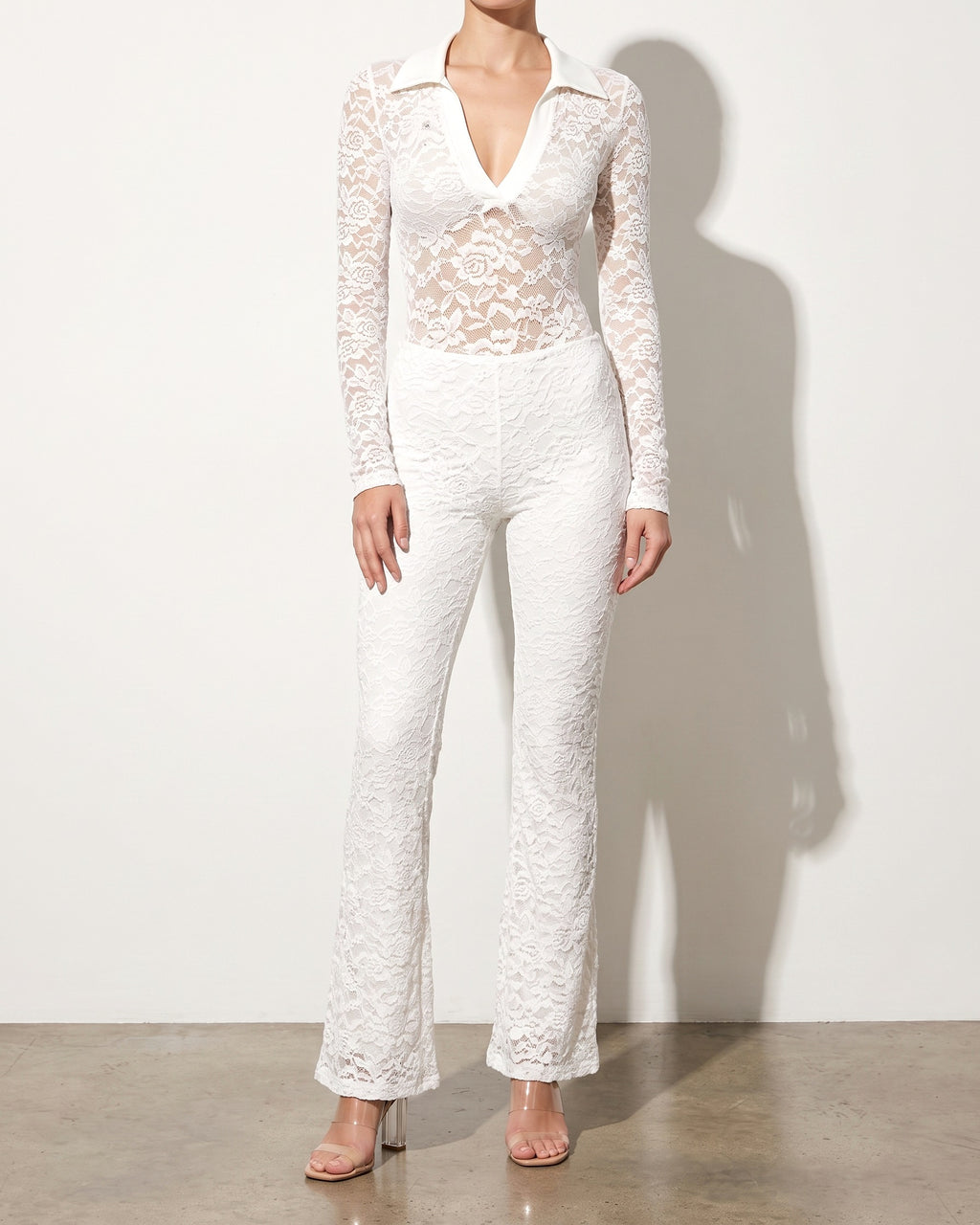 White lace bodysuit and pants set, alternate front view on model