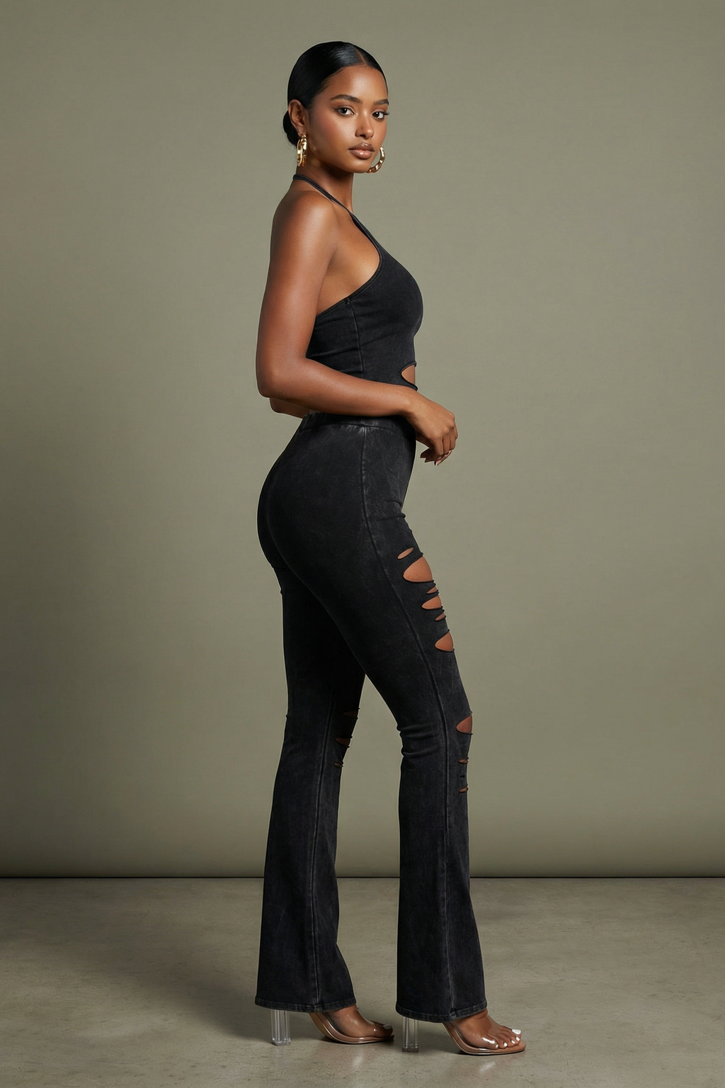Black mineral wash cutout wide leg pants showing side cutout detail