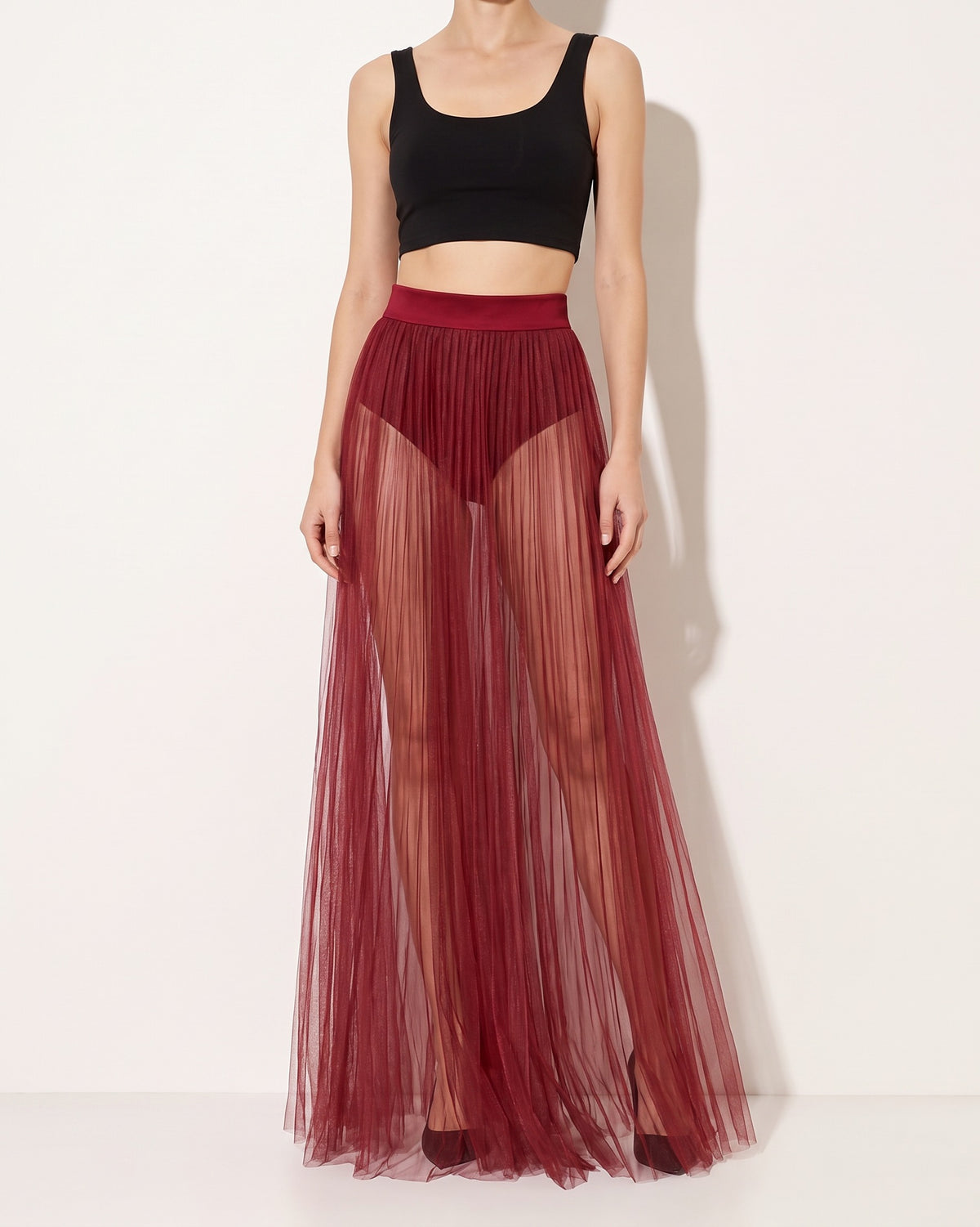 Muvin women's burgundy pleated mesh maxi skirt, front view on model