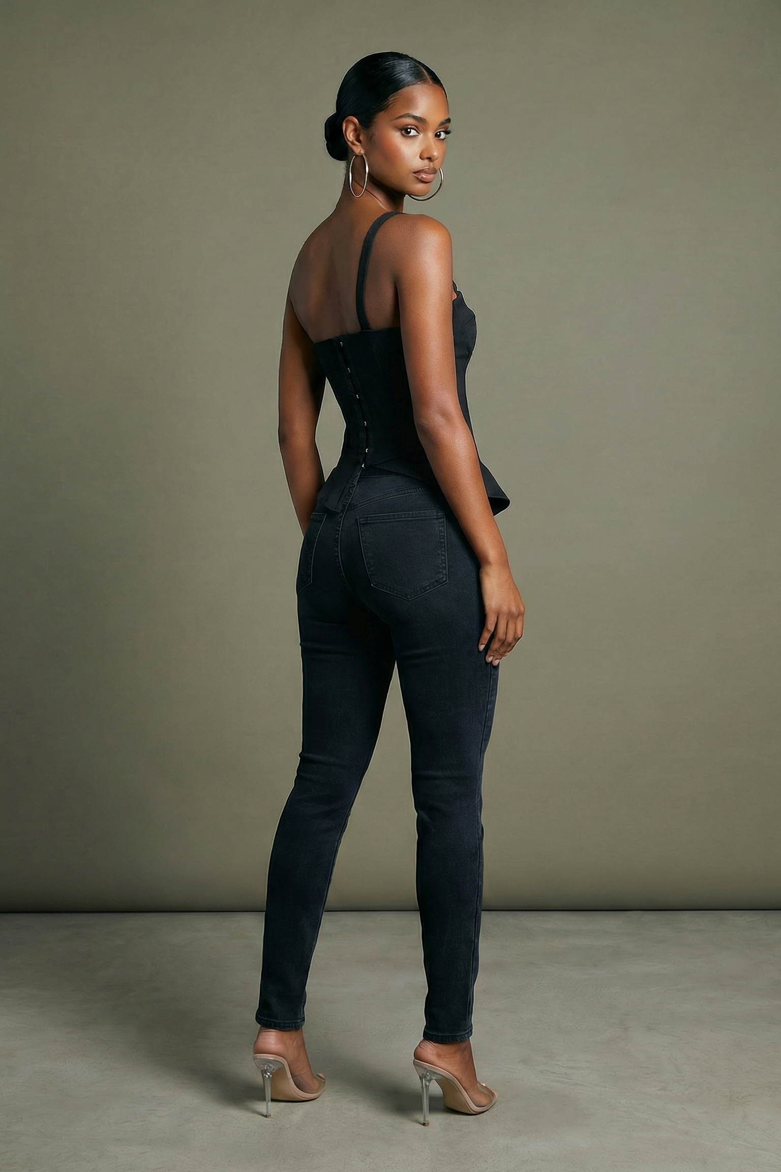 Black one shoulder asymmetrical tank top with open back detail