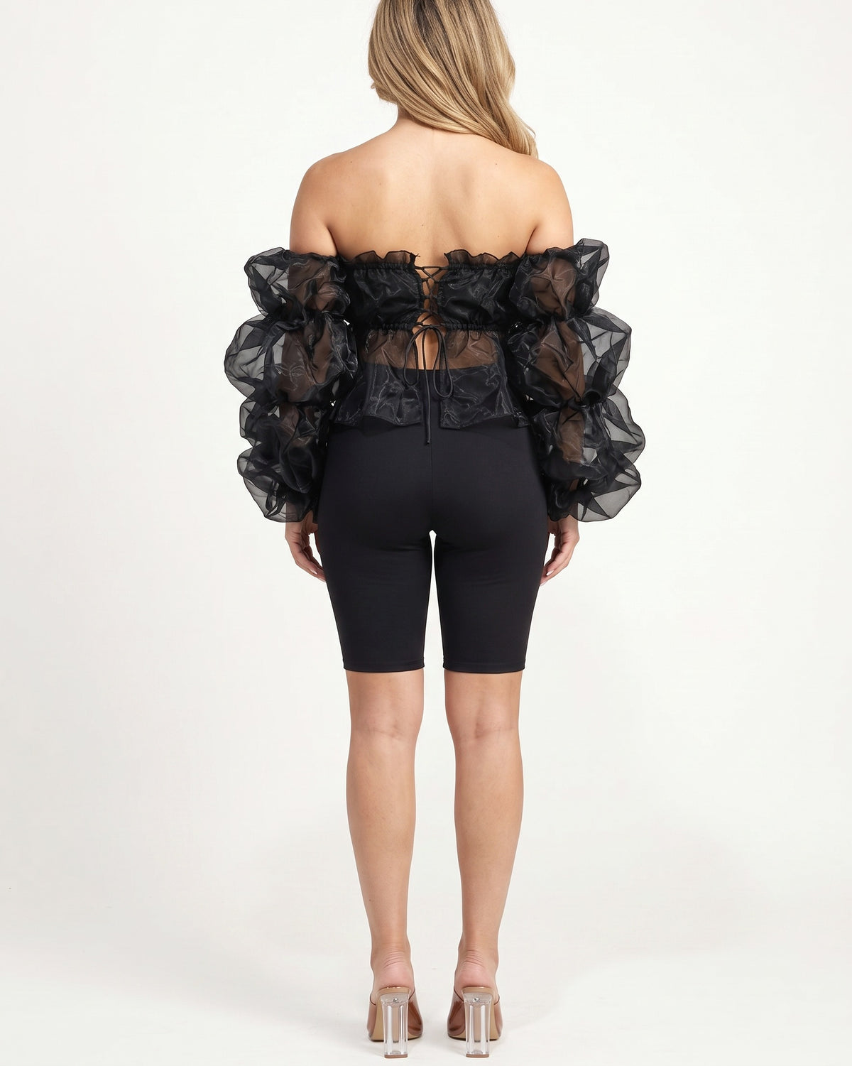 Black organza sleeve detailed set, back view on model