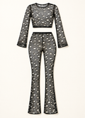Black hole fishnet long sleeve crop top and flared pants set — front flat lay