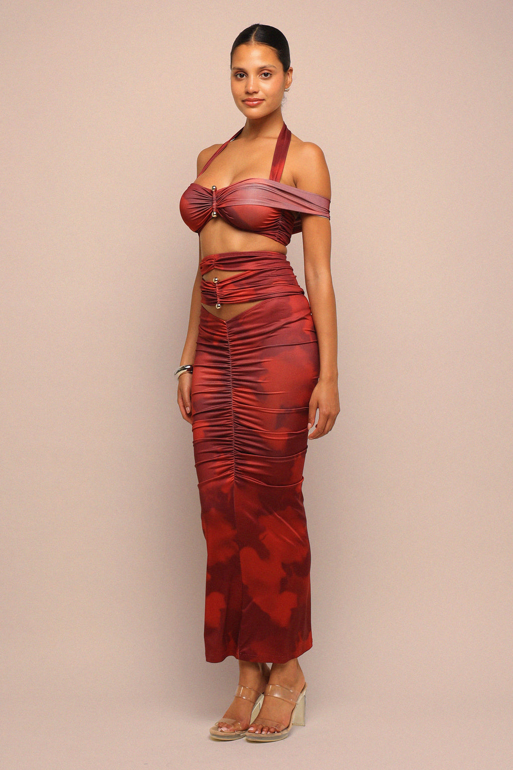 Wine combo cutout off shoulder top and maxi skirt set, side view on model