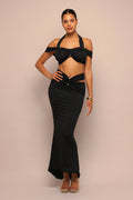 Black off shoulder maxi skirt set, back view on model