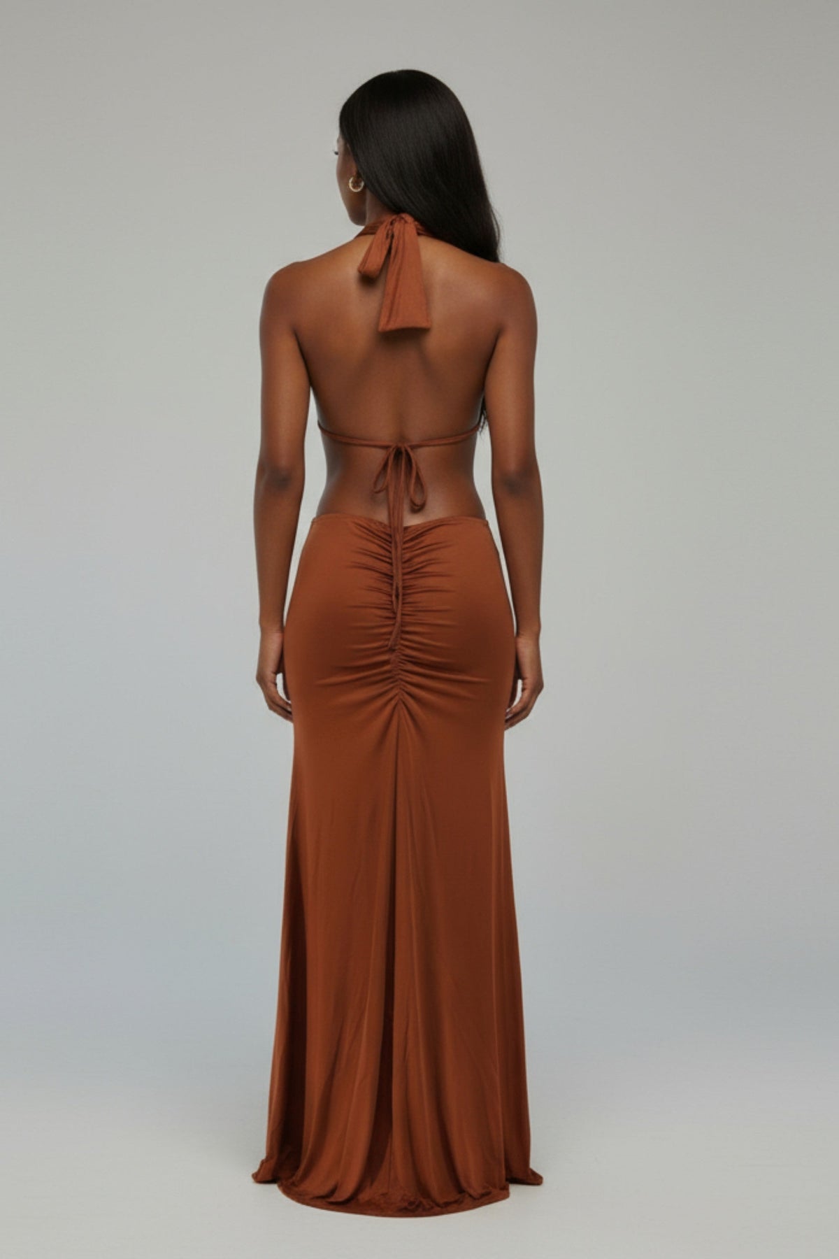 Brown cutout open back halter maxi dress, detail view on model