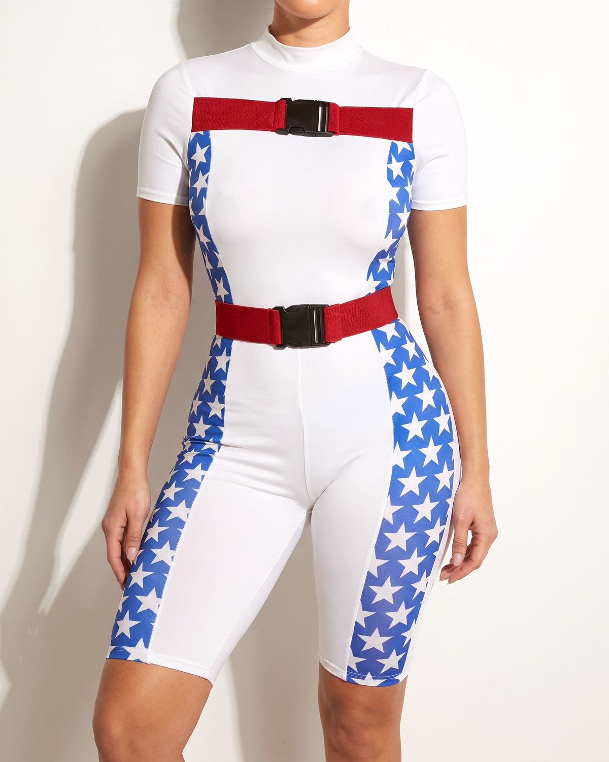 Muvin women's white star buckle strap jumpsuit, front view on model