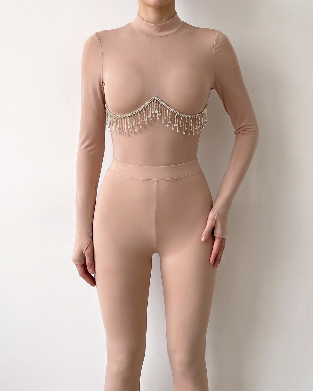 Nude rhinestone underboob trimmed bodysuit, alternate front view on model