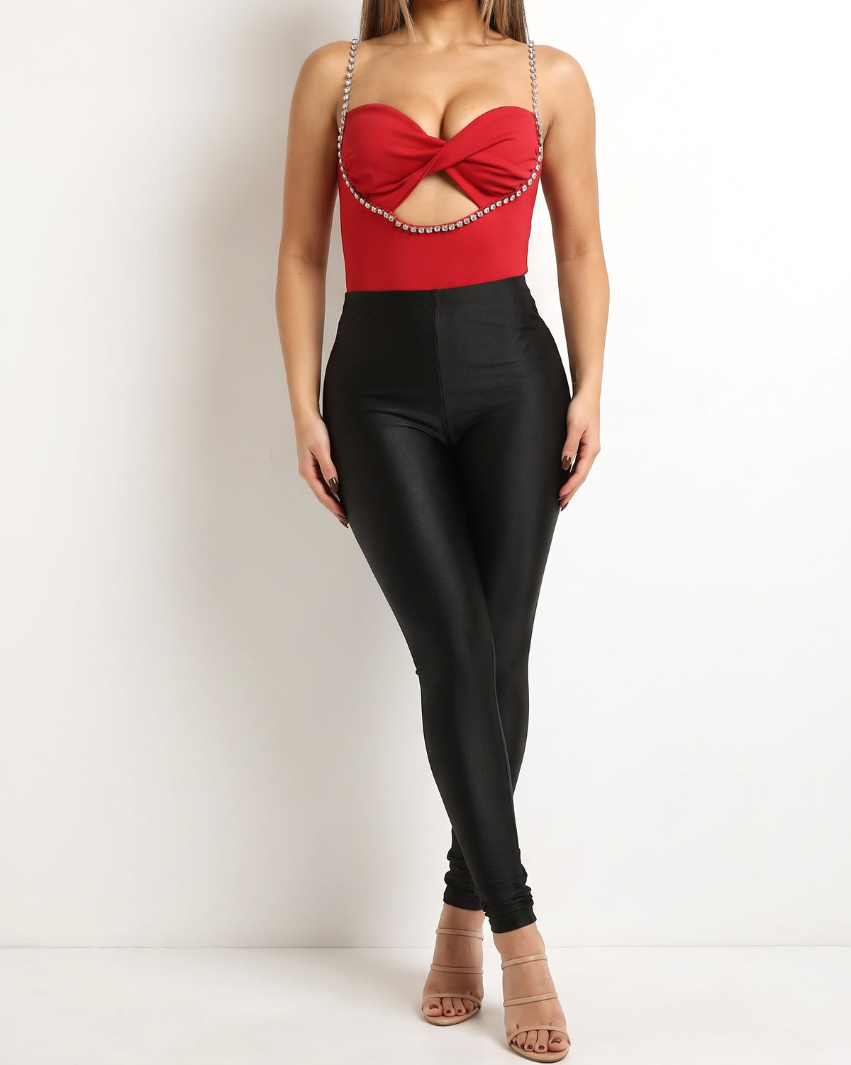 Red rhinestone trimmed bodysuit, front view on model