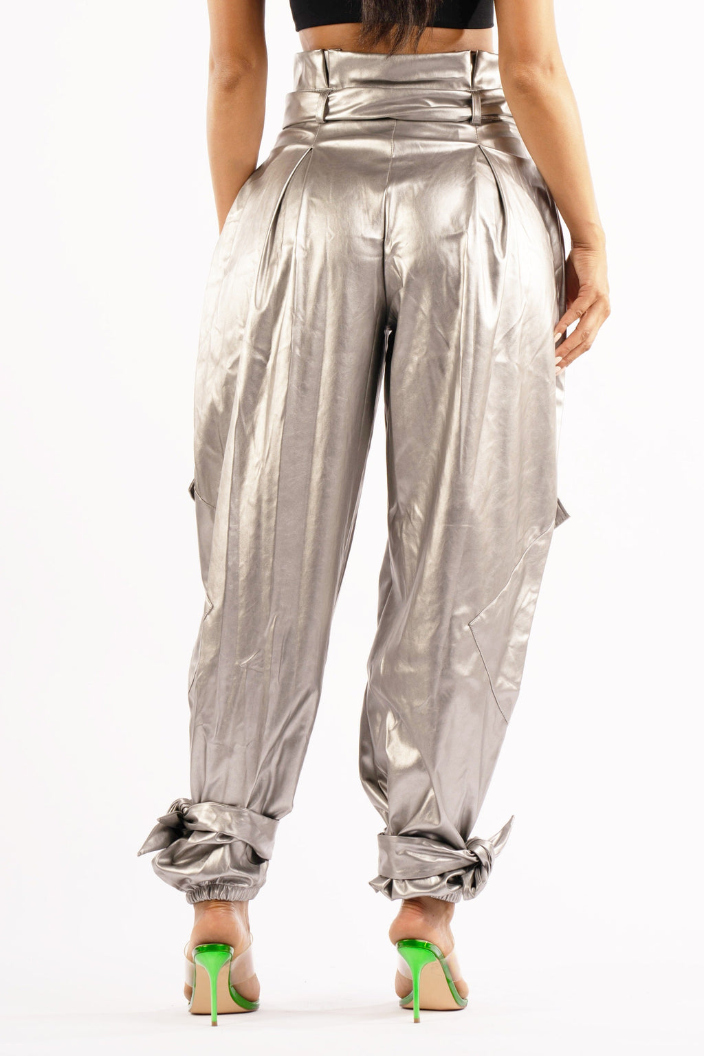 Silver metallic PU jogger pants, back view on model