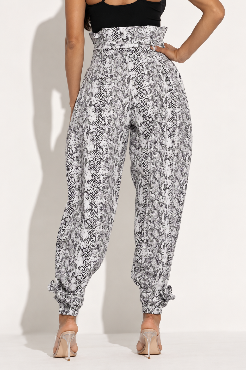 Grey snakeskin paperbag cargo jogger pants, rear view showing paperbag waist and ankle ties