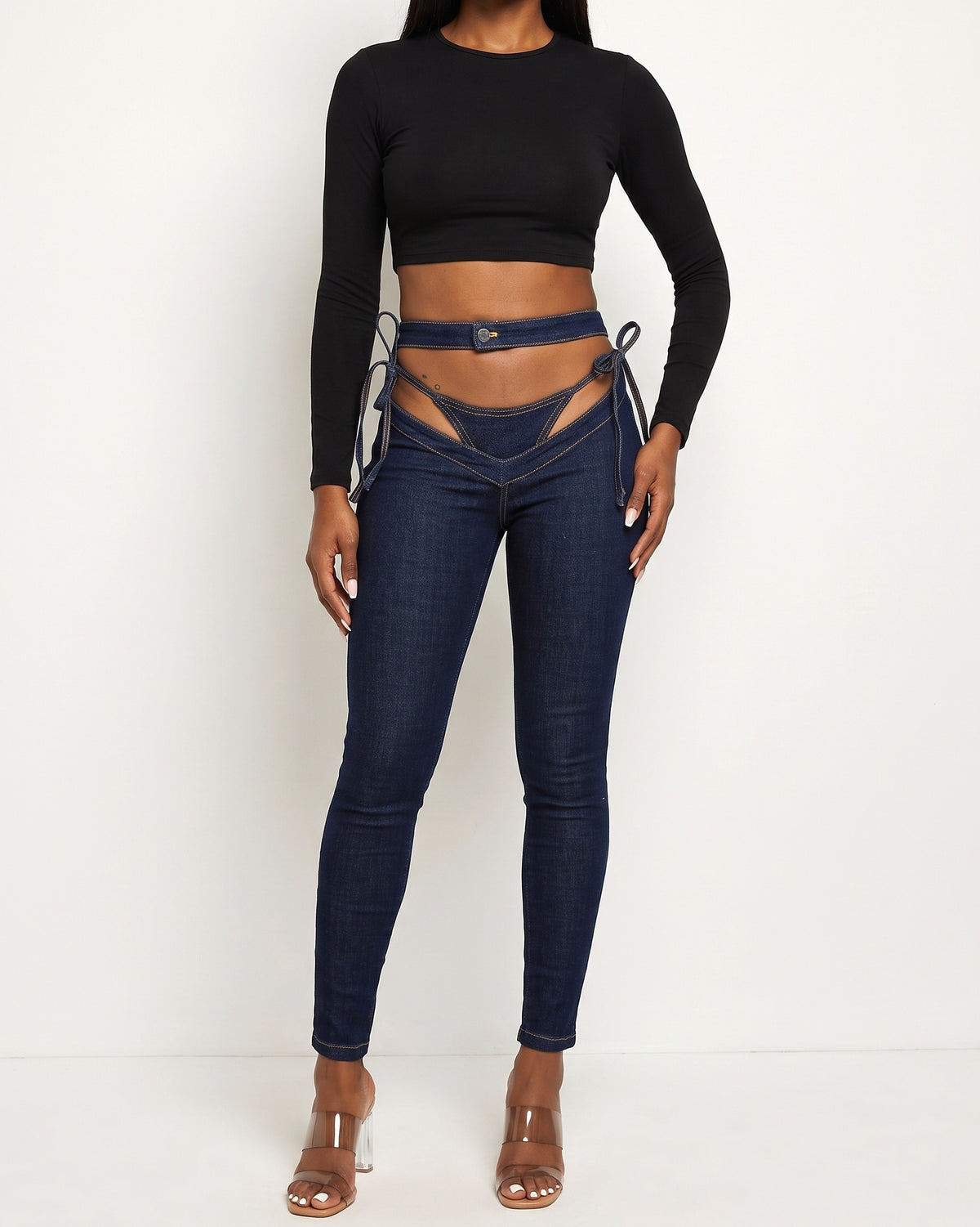 Indigo bikini cutout denim pants, alternate front view on model