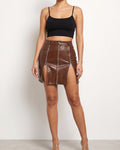 Brown zipper detailed mini skirt, front view on model