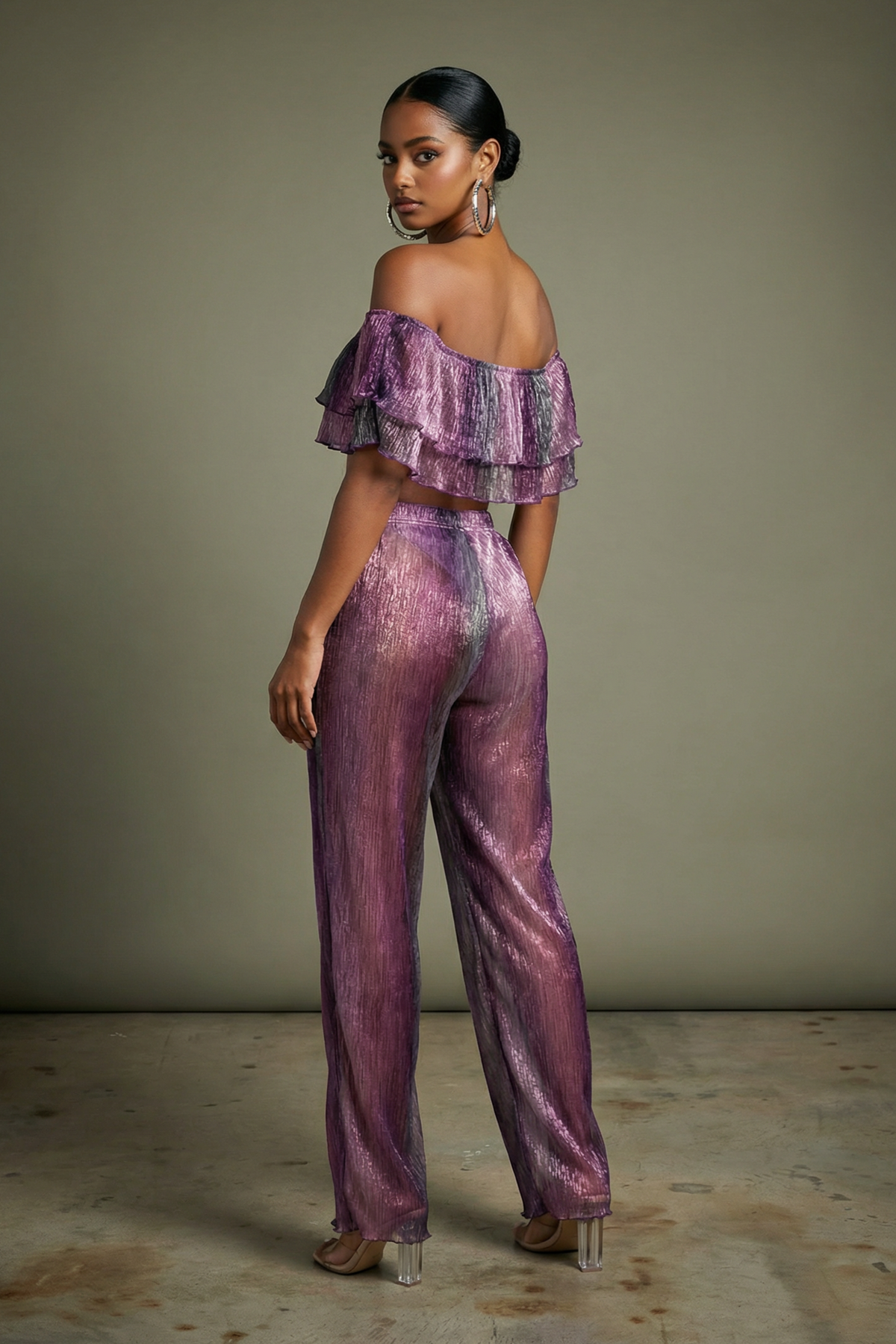 Purple tiered ruffle off shoulder top and wide leg pants, side view