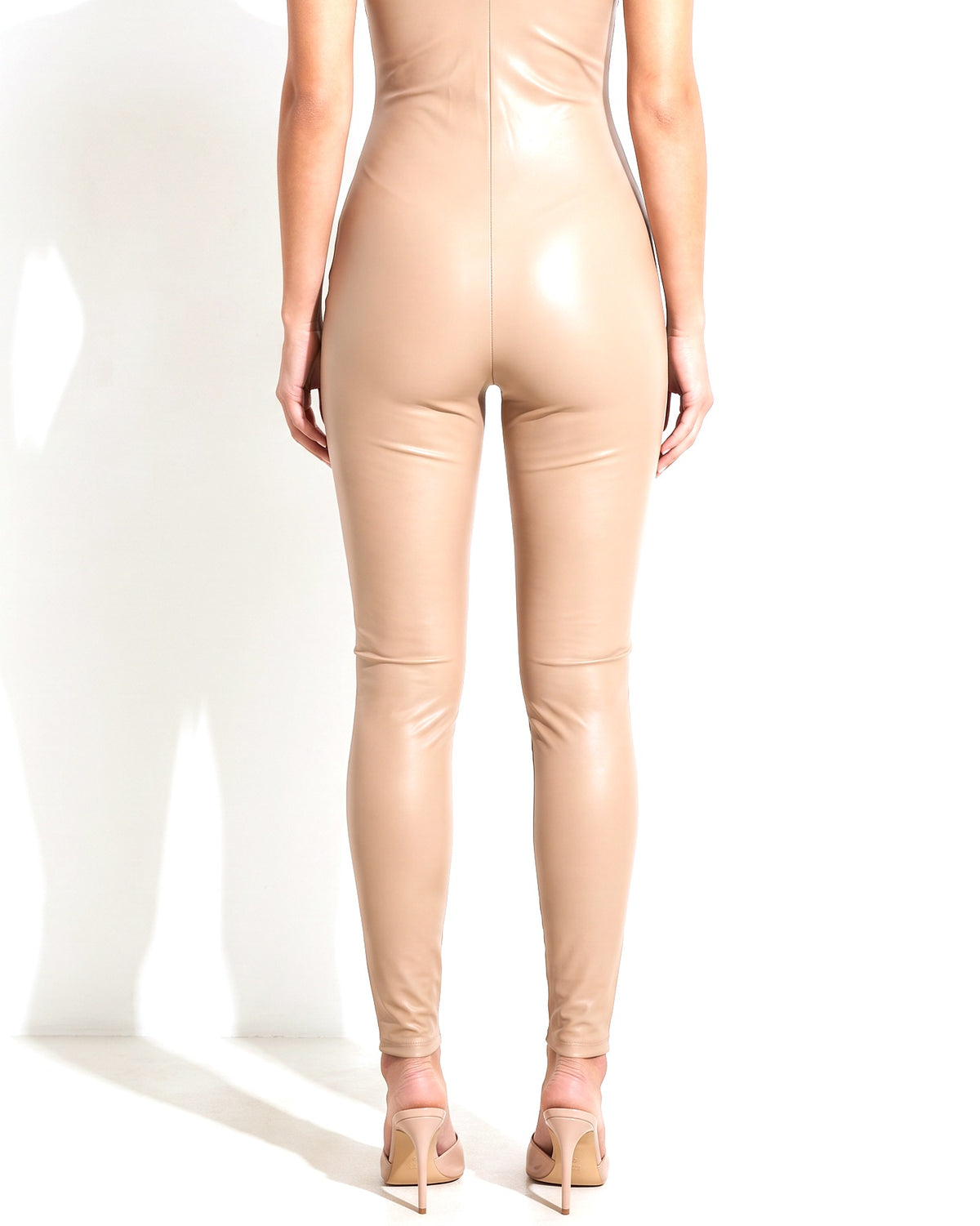 Nude satin PU tank catsuit, back view on model