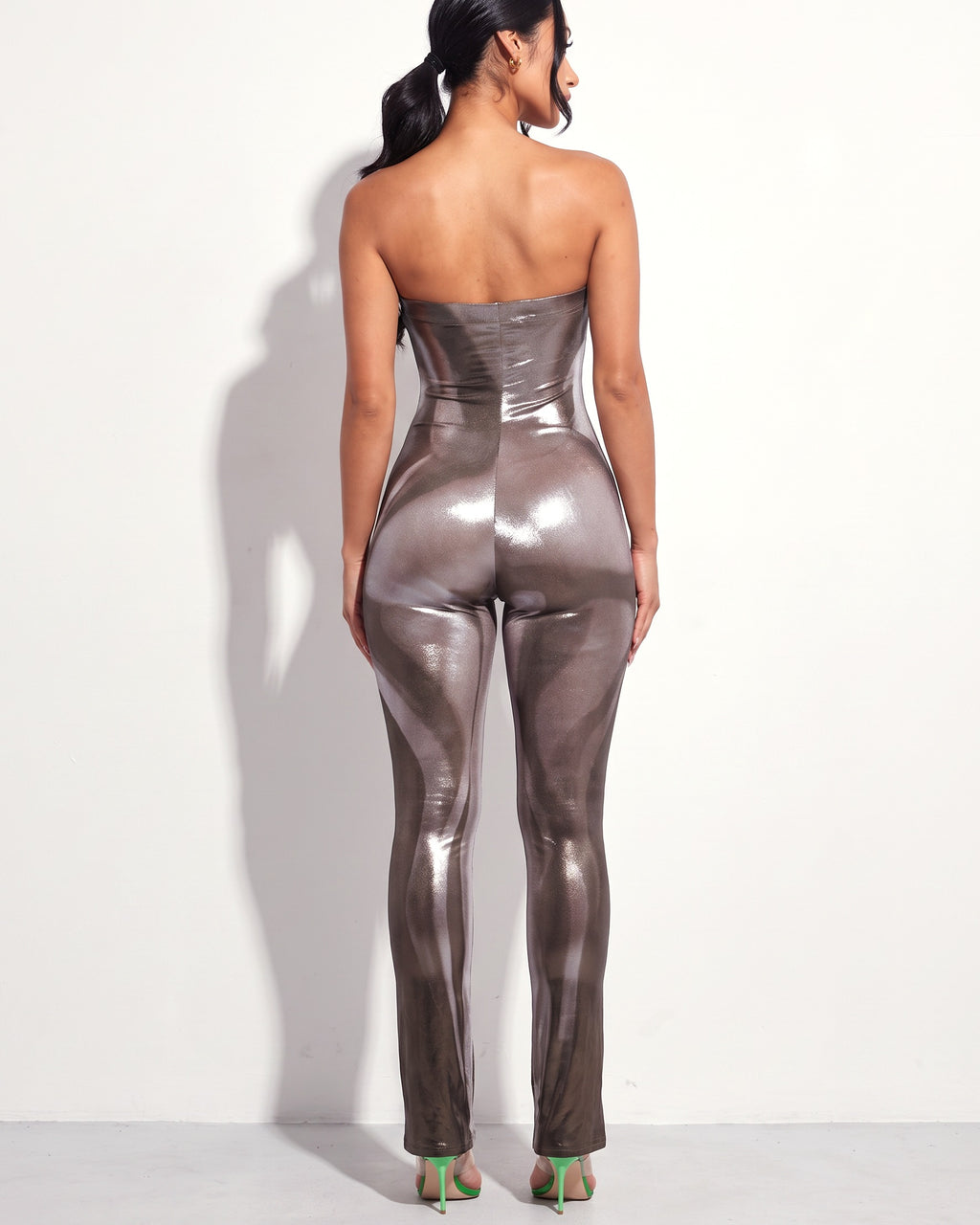 Silver metallic bodyheat print tube jumpsuit, back view on model