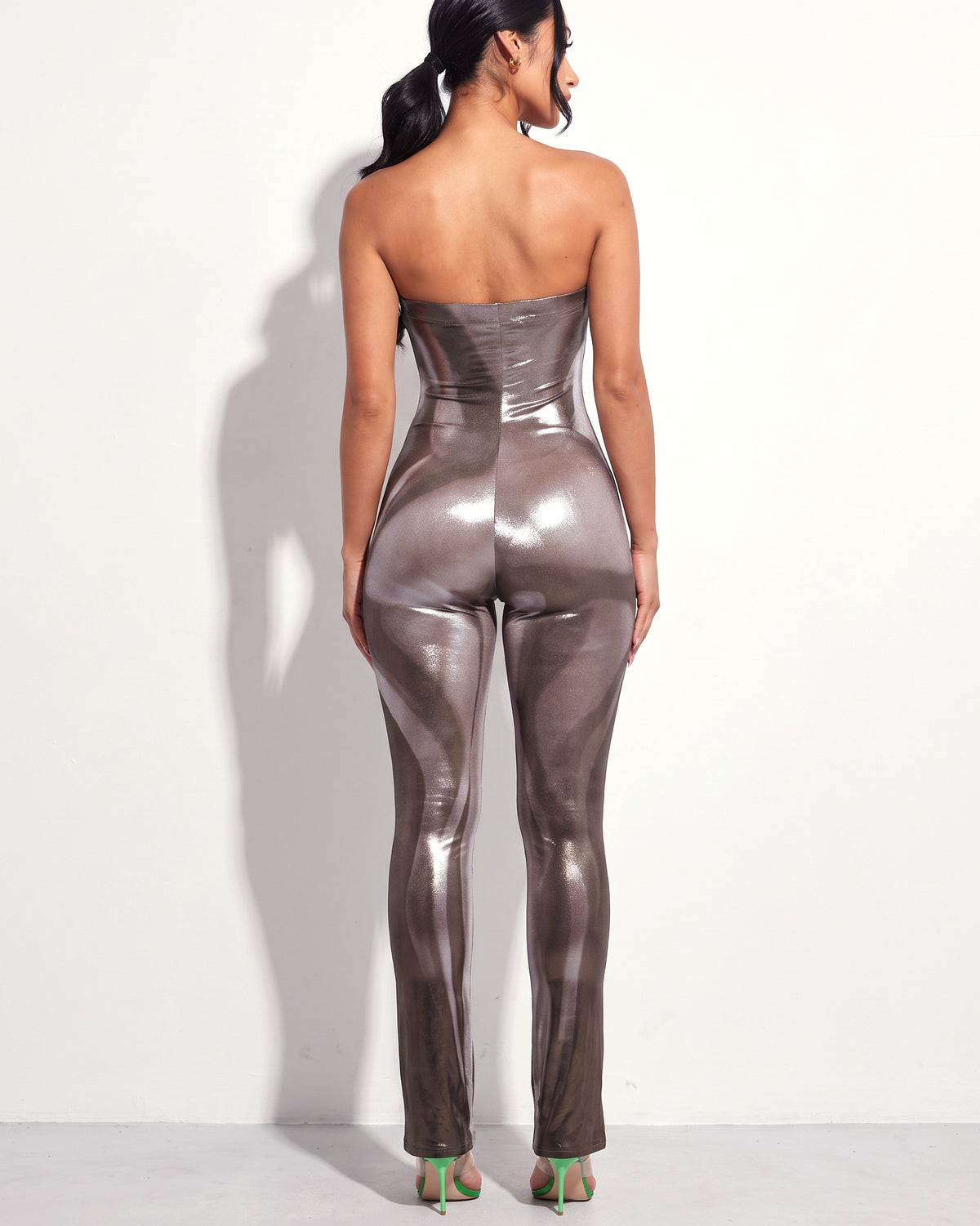 Silver metallic bodyheat print tube jumpsuit, back view on model