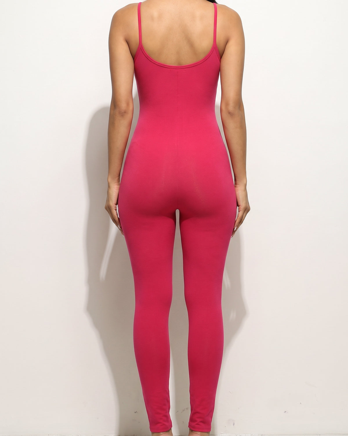 Fuchsia soft jersey jumpsuit, back view on model