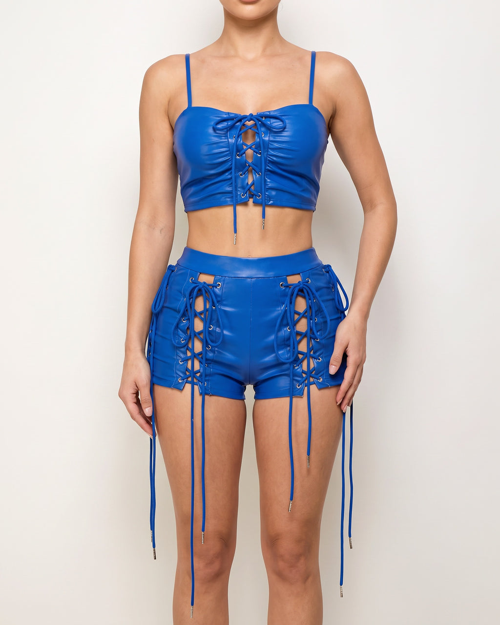Royal matte PU all over lace-up top and shorts set, alternate front view on model