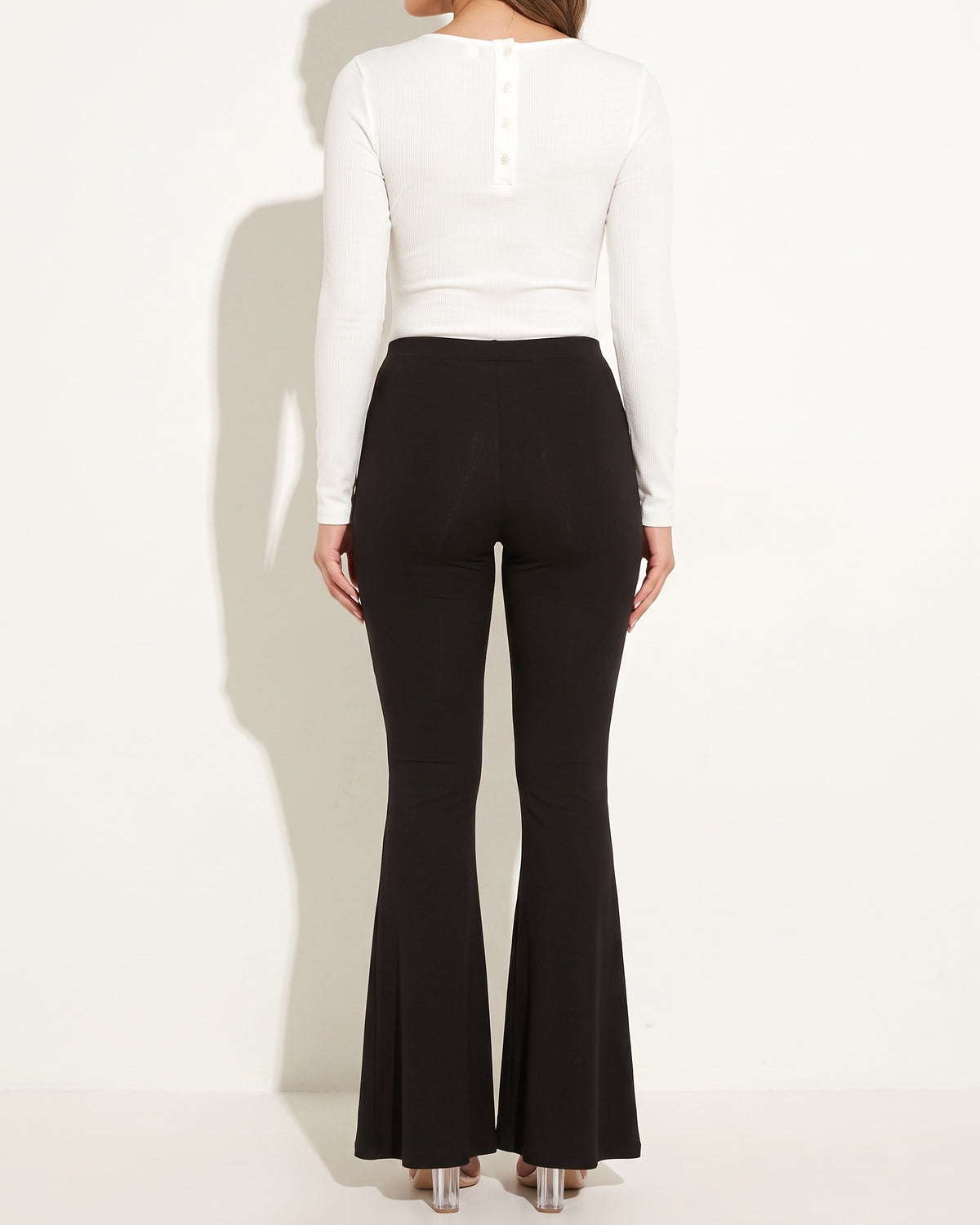 White ribbed henley deep V neck bodysuit, back view on model