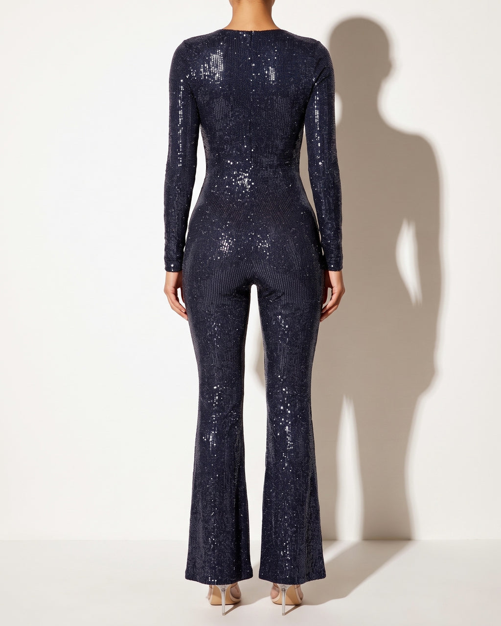 Navy bikini top long sleeve jumpsuit, back view on model