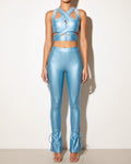 Muvin women's light blue cut out top and tide bottom pants set, front view on model