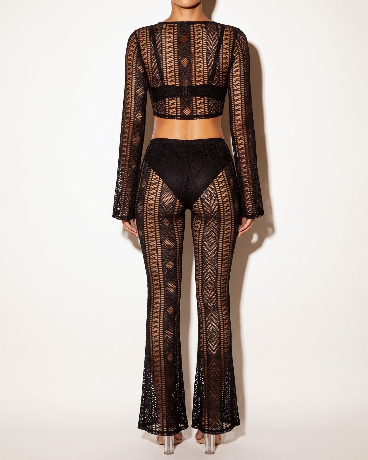 Black geo lace sheer flared pant set, back view on model