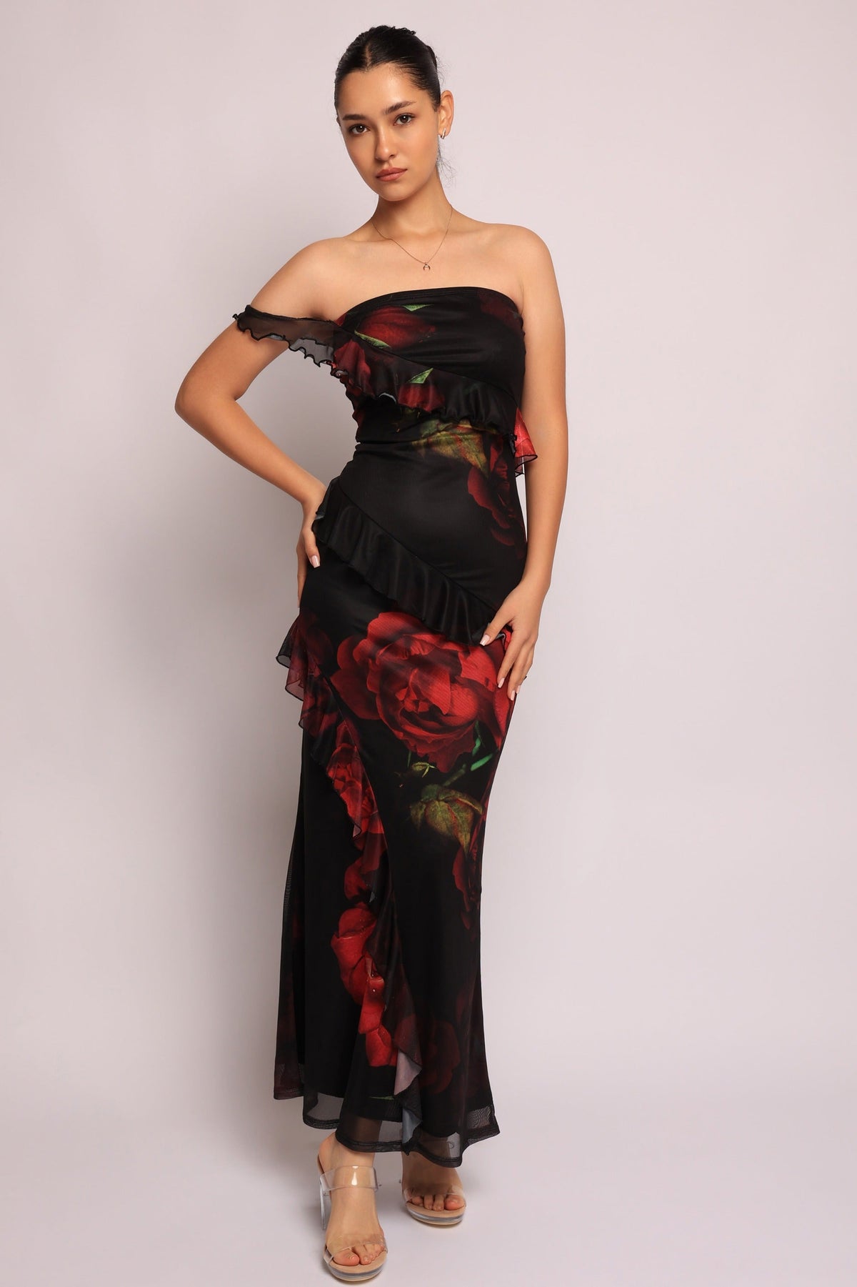 Black combo floral ruffle maxi dress, side view on model