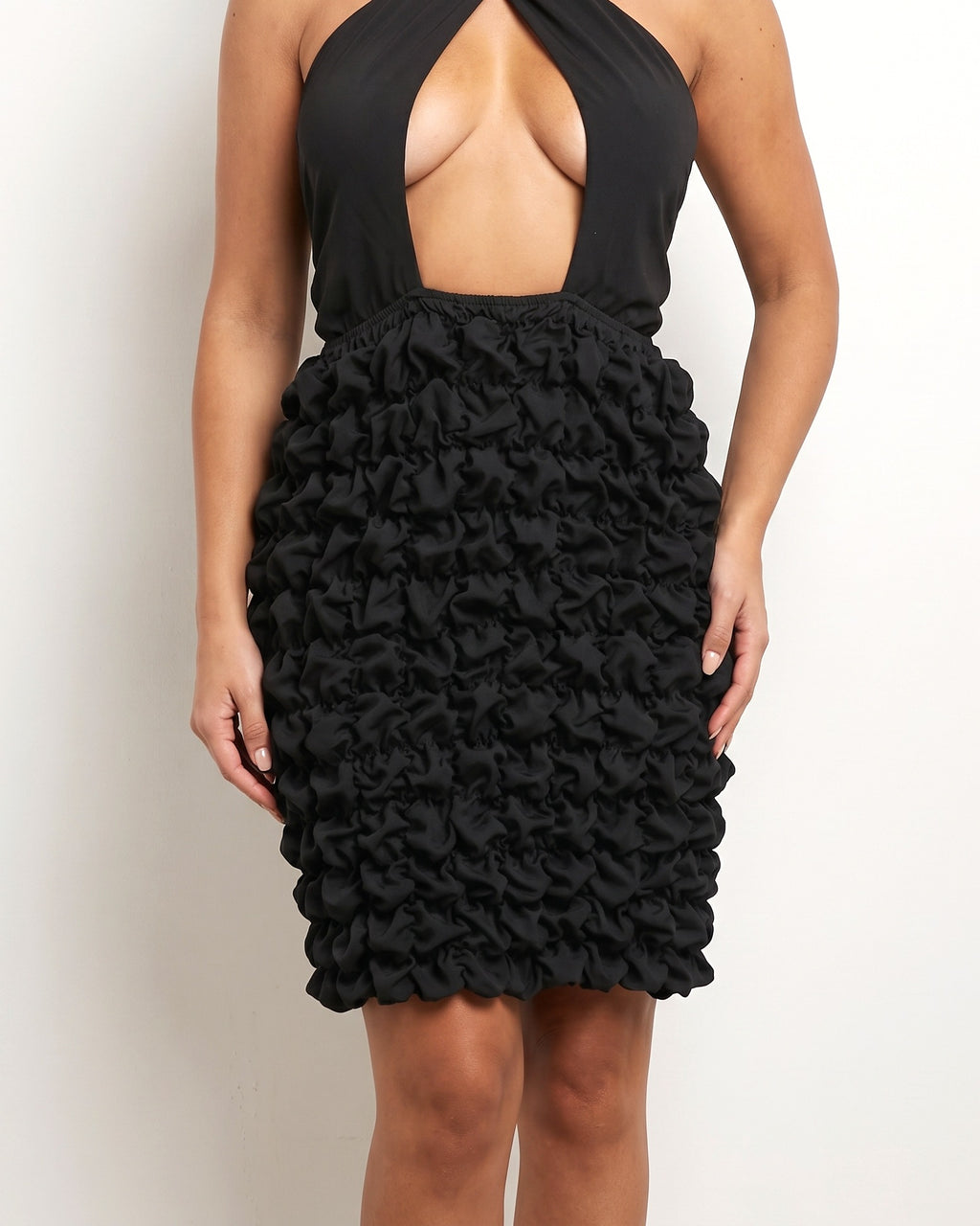 Black crinkled skirt halter dress, alternate front view on model