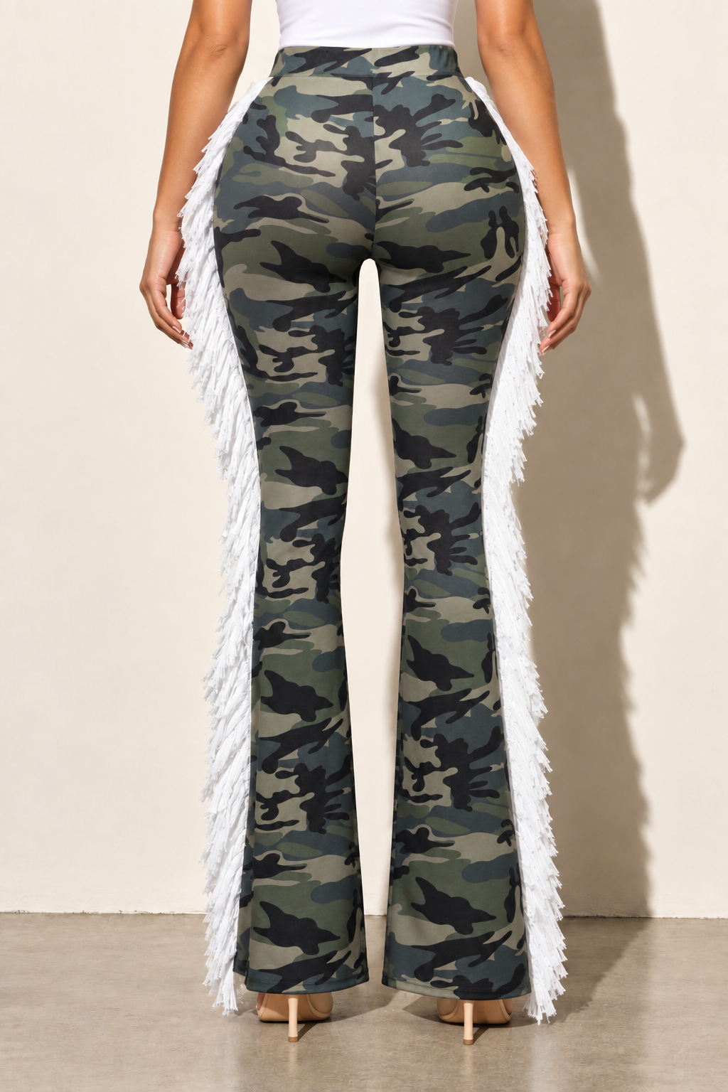 Camouflage flared pants with white side fringe — back view