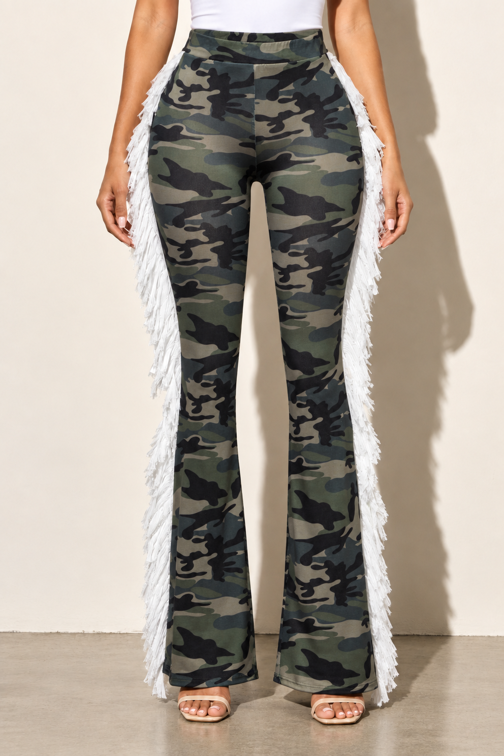 Camouflage flared pants with white side fringe — front view