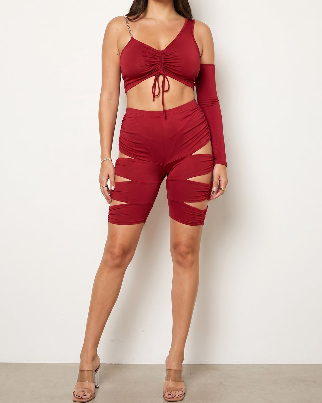 Muvin women's burgundy cutout detailed asymmetric top set, front view on model