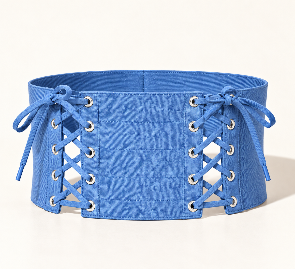 Denim blue wide lace-up belt, front view with silver eyelets
