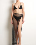 Muvin women's black vacation rhinestone sunsuit set, front view on model