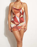 Muvin women's brown multicolor triangle color block printed halter mini dress, front view on model