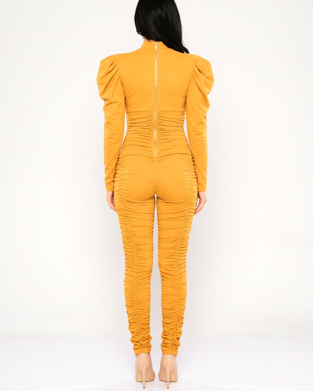 Mustard ruched jumpsuit with power shoulder, back view on model