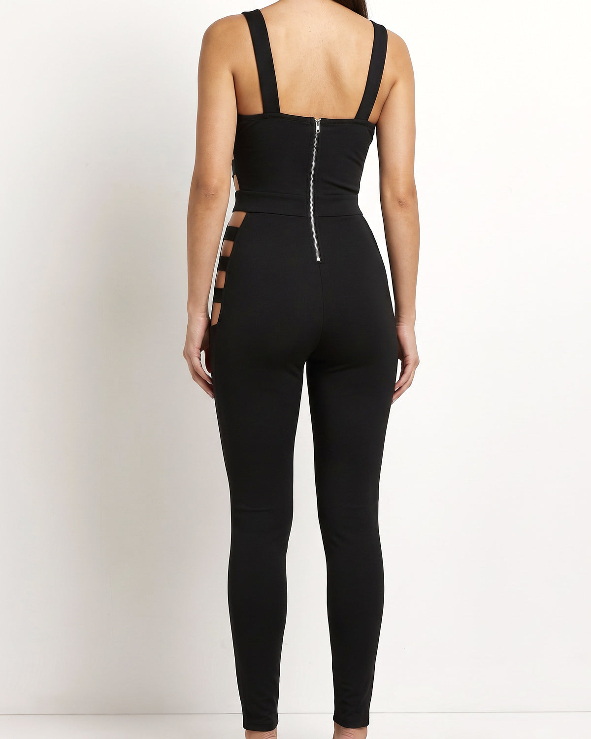 Black cut-out line jumpsuit, back view on model