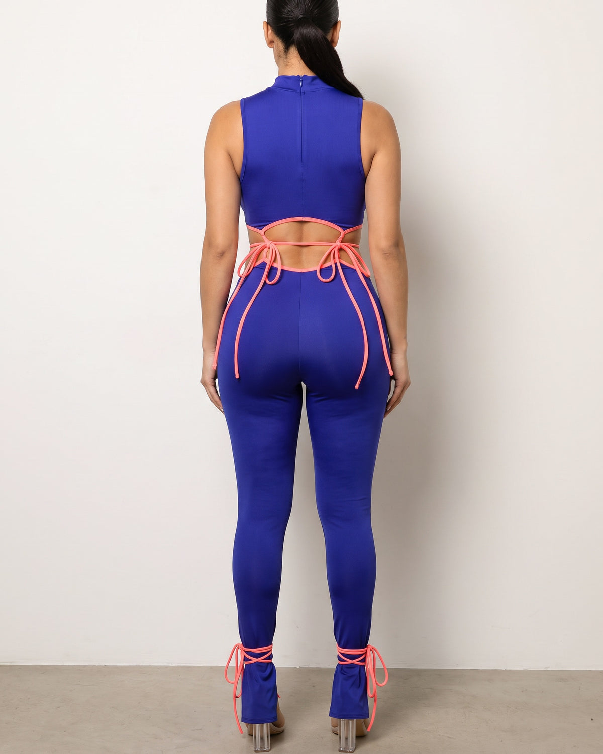 Royal string tie jumpsuit, back view on model