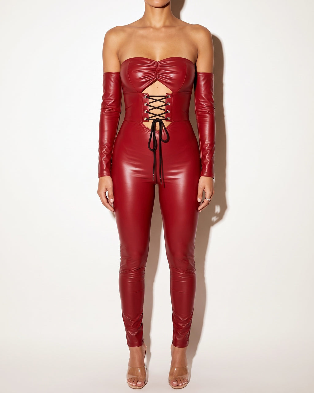 Muvin women's dark red lace up off shoulder PU jumpsuit, front view on model