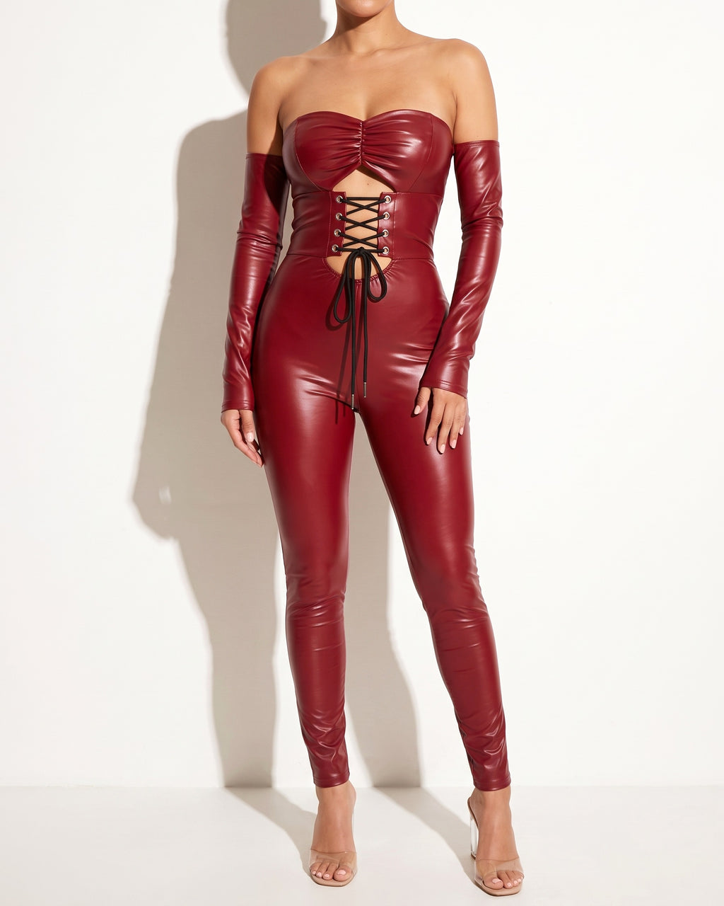 Dark red lace up off shoulder PU jumpsuit, alternate front view on model