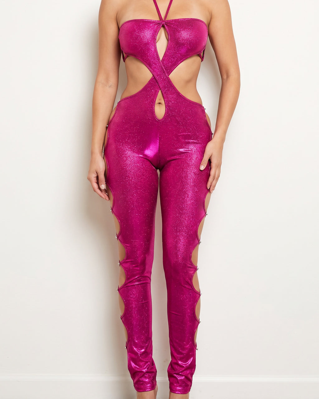 Fucshia and gold glittery cutout halter neck keyhole jumpsuit, alternate front view on model