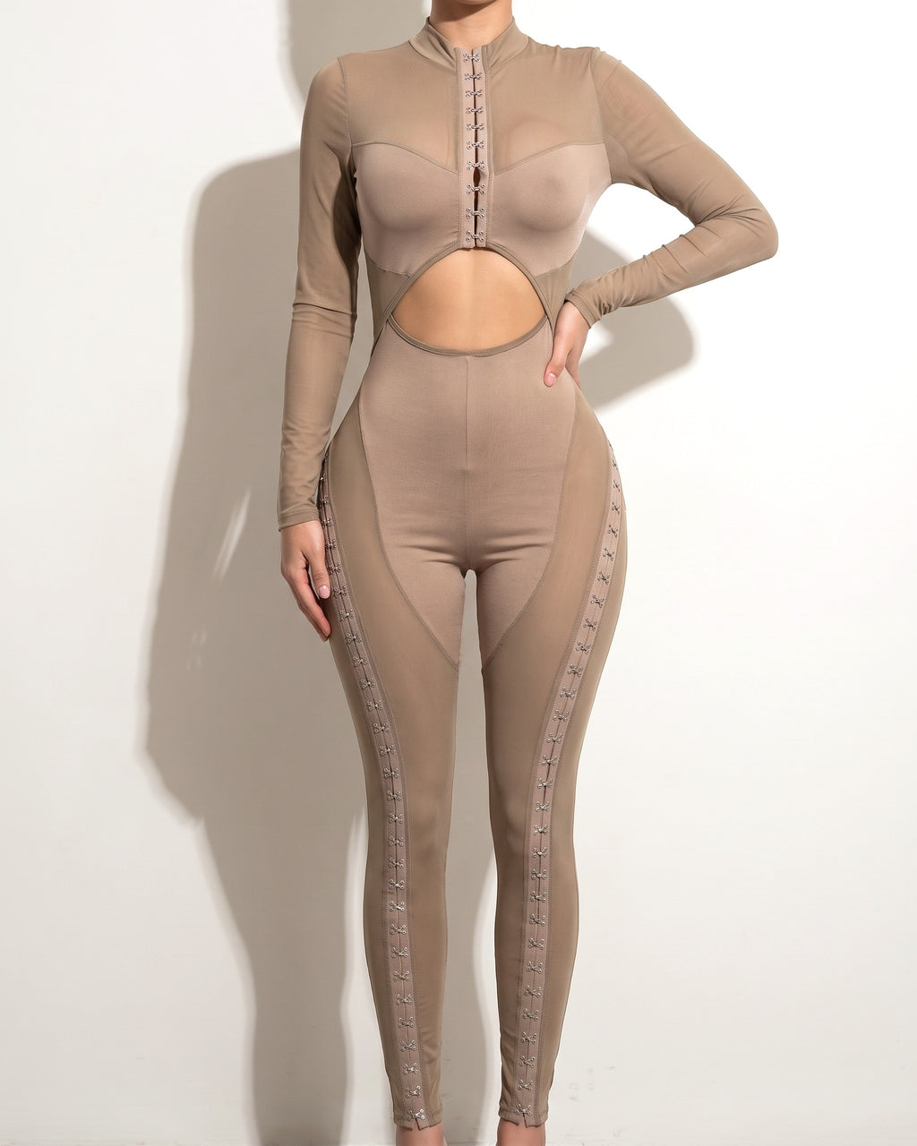 Taupe front hook and eye jumpsuit, alternate front view on model