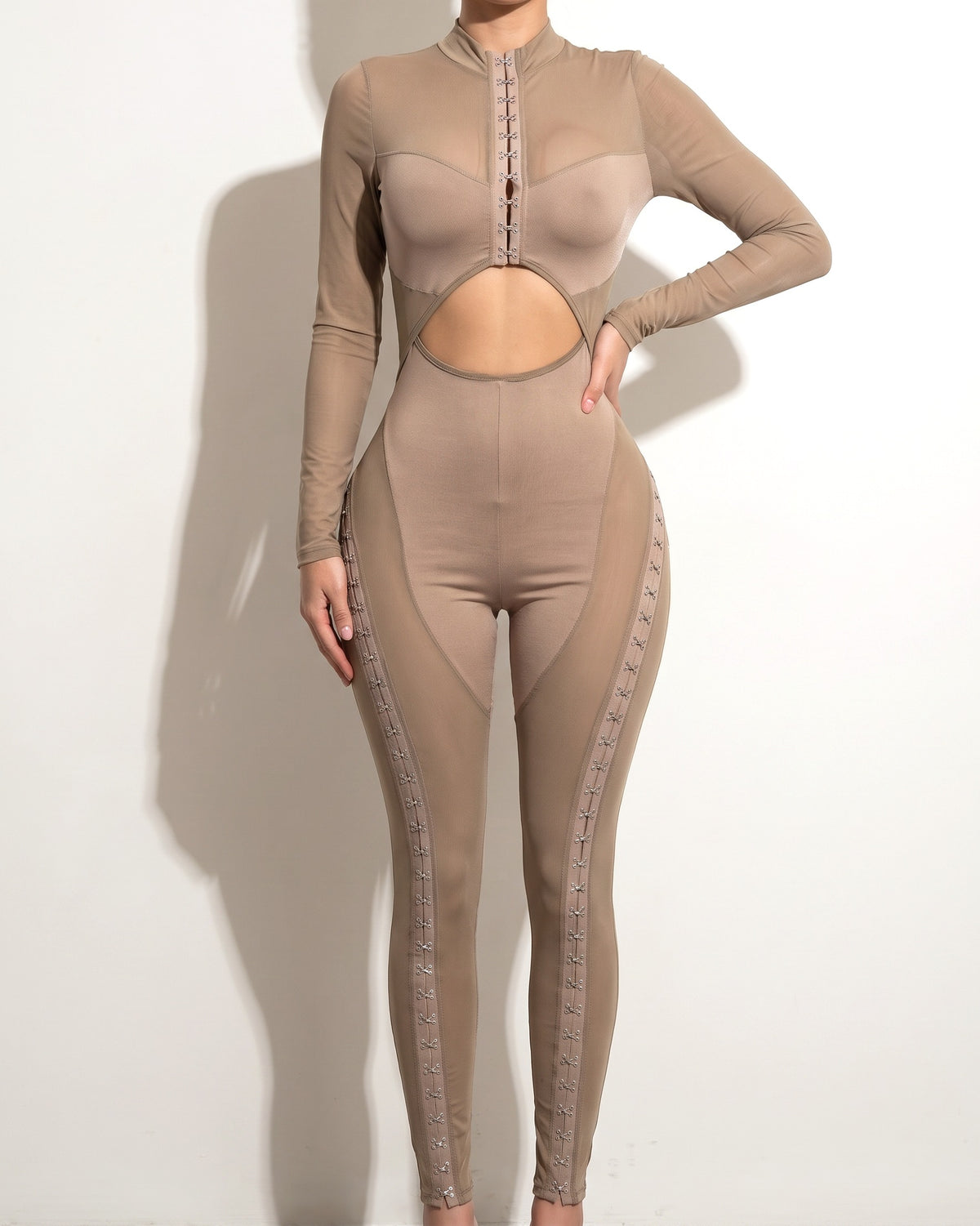 Taupe front hook and eye jumpsuit, alternate front view on model