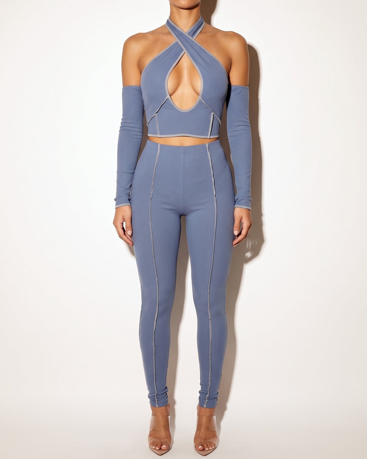 Denim blue overlock detailed cross halter keyhole neck off shoulder set, alternate front view on model