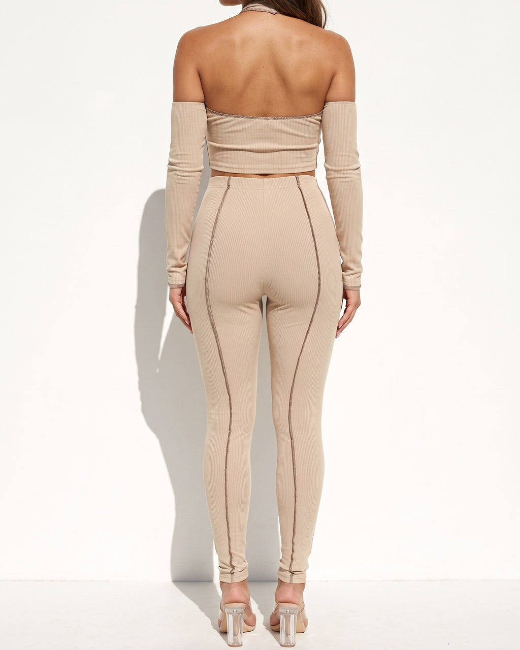 Taupe overlock detailed cross halter keyhole neck off shoulder set, back view on model
