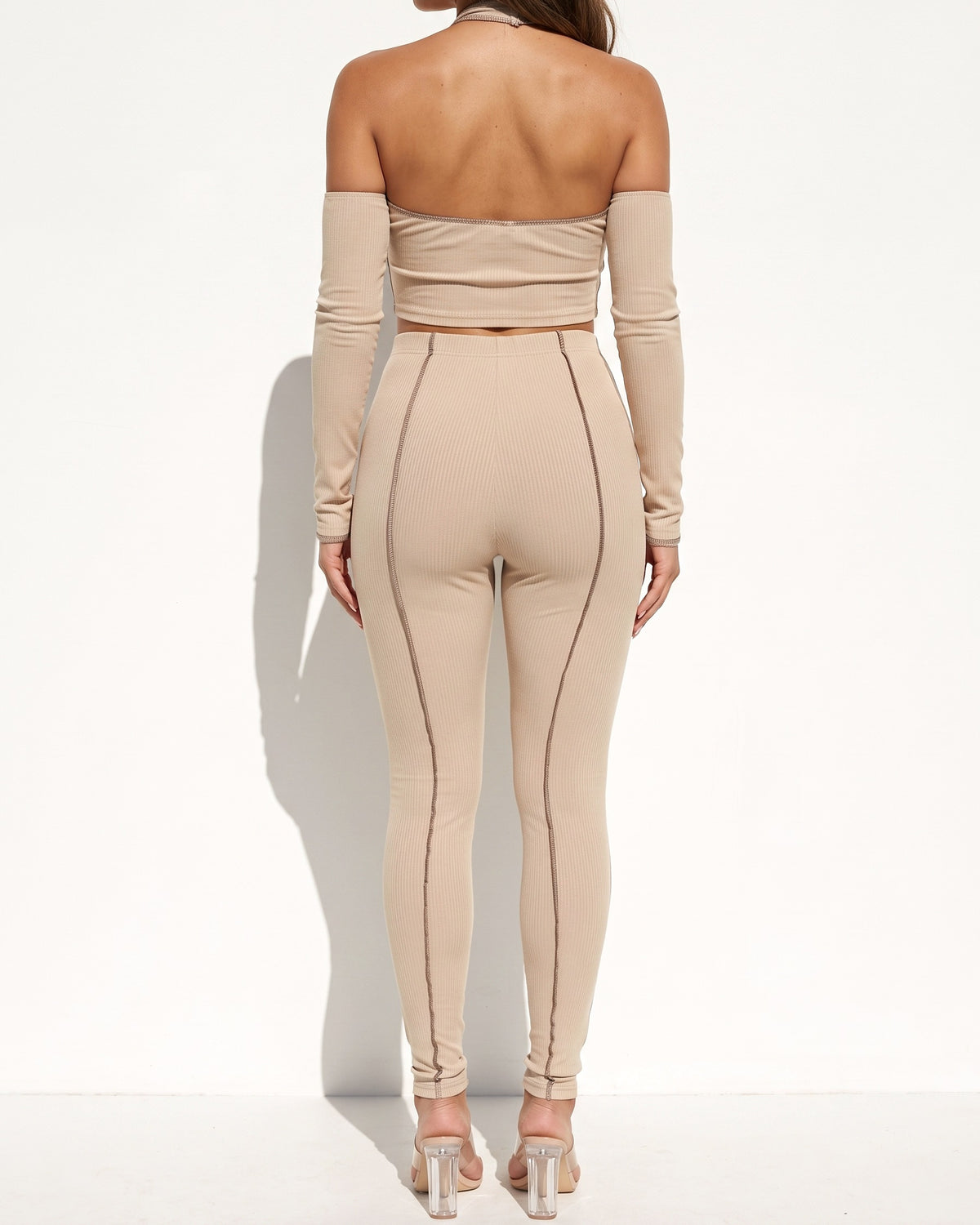 Taupe overlock detailed cross halter keyhole neck off shoulder set, back view on model